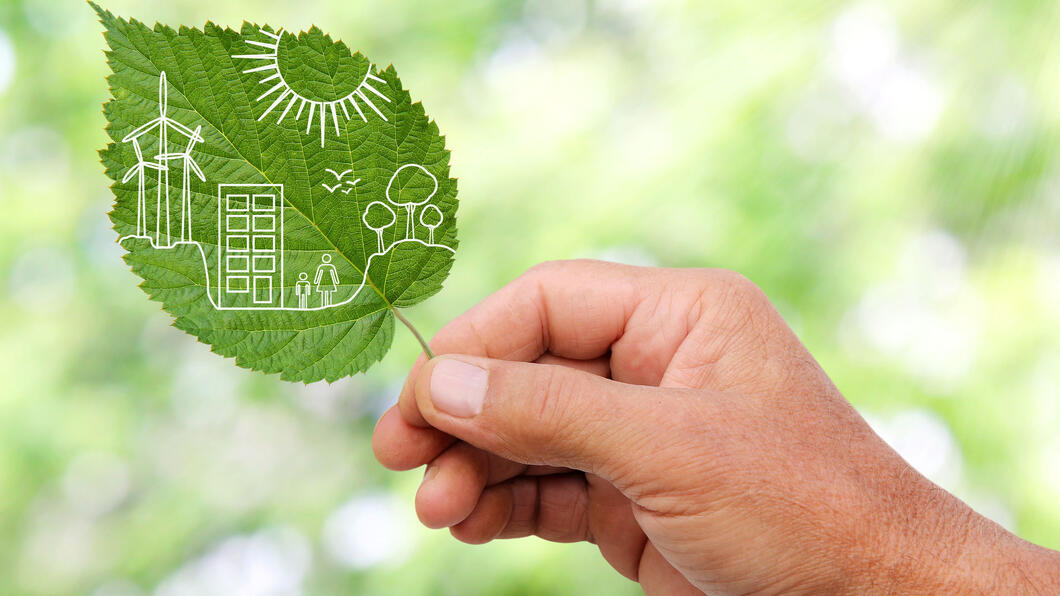 Blad met afbeelding groene stad
